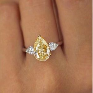 NEXTEARRINGS Two Tone Pear Cut Yellow & White Sapphire Engagement Ring